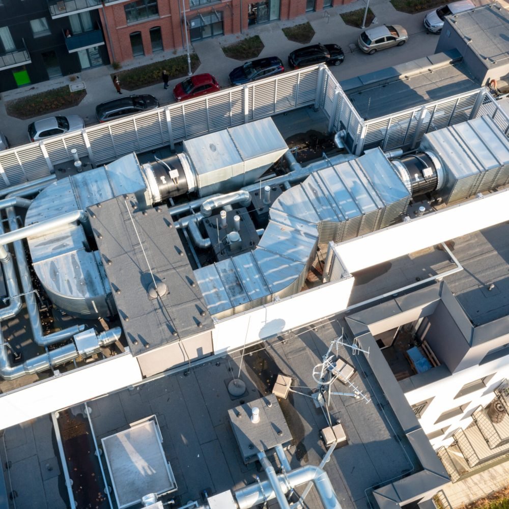 Ventilation and air conditioning system on the roof of the house. View from above